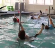 Seniors strip down for pole fitness in the pool