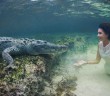 Daredevil Model Poses Underwater Inches From Deadly Crocodiles