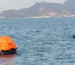 M75 Unmanned Surface Vehicle Rescuing Troubled Swimmer On Sea