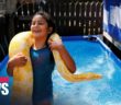 8-year-old Israeli girl swims with her 11-foot long pet python