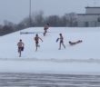 Boys High School Swimming Team Hits Snow Hill in Swimsuits, per Tradition