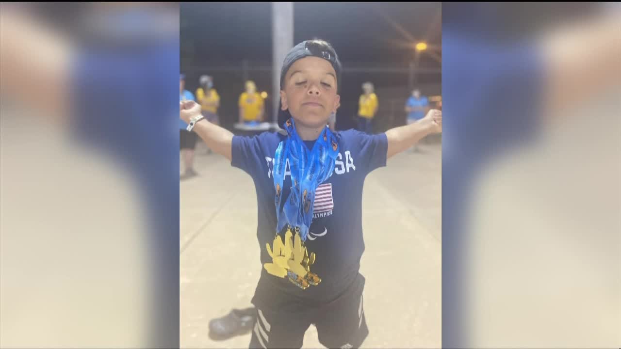 Local Para Swimmer Inspired by the Olympic and Paralympic Museum | KOAA 5