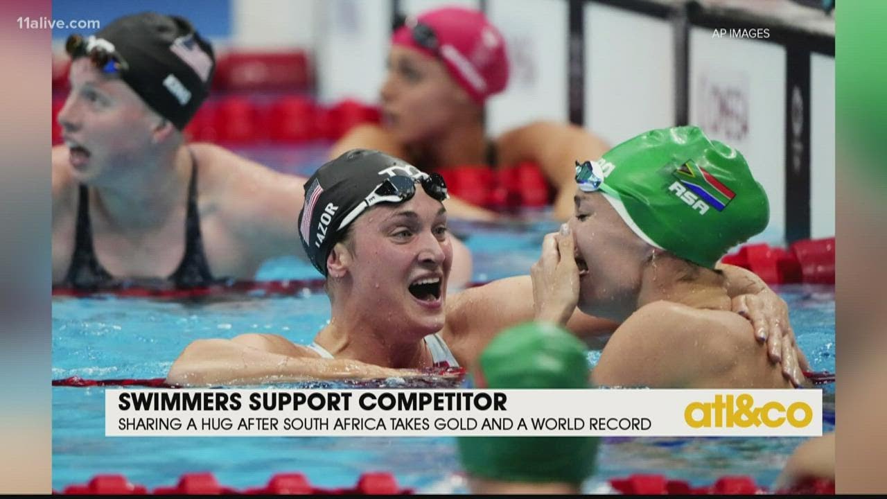 Team USA Swimmers Support Winning Competitor | 11Alive