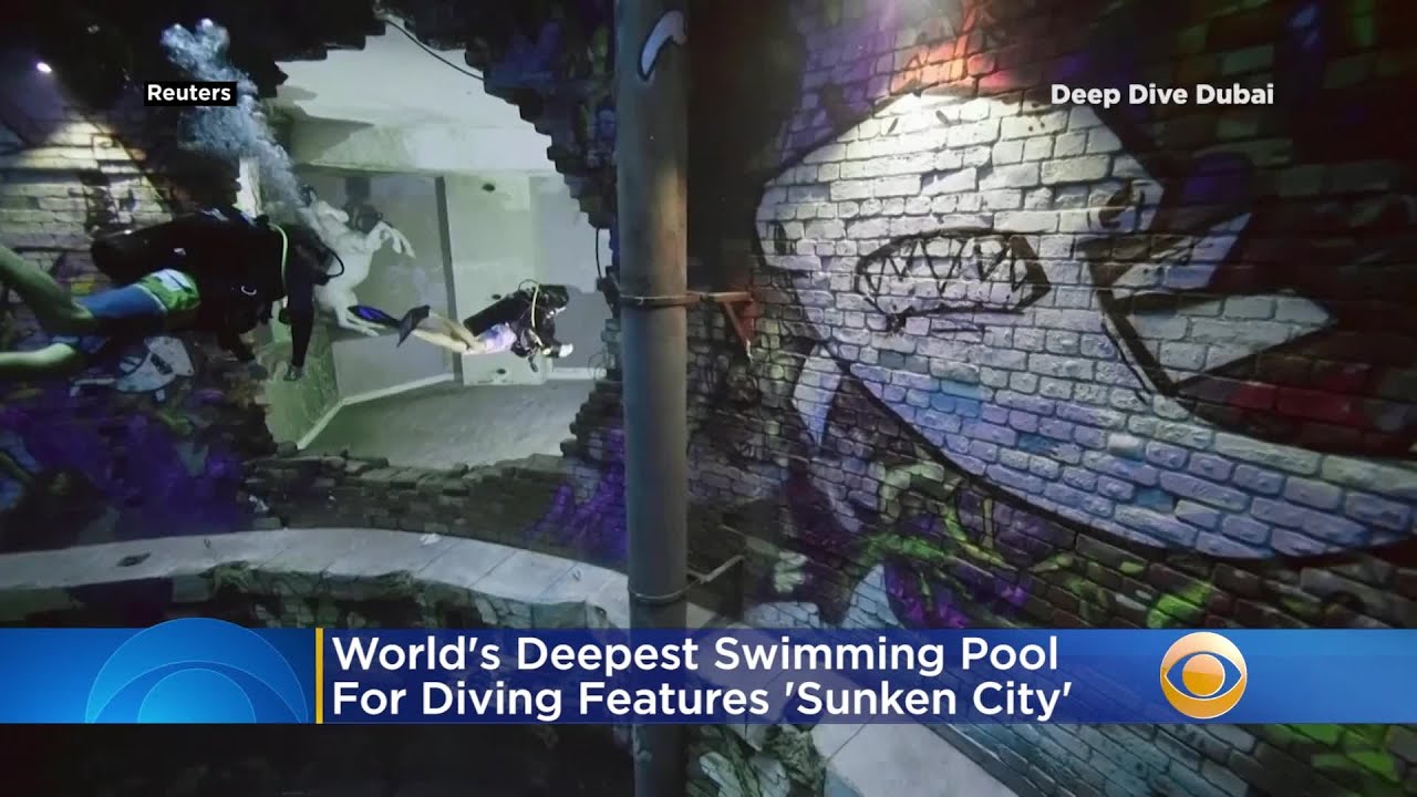 World’s Deepest Swimming Pool For Diving Features ‘Sunken City’ With Apartment, Garage And Arcade | CBS Local News