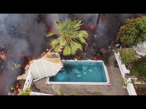 La Palma Volcano: Drone Video Shows Black Lava Swallowing Pool, Homes on Its Way to Coast