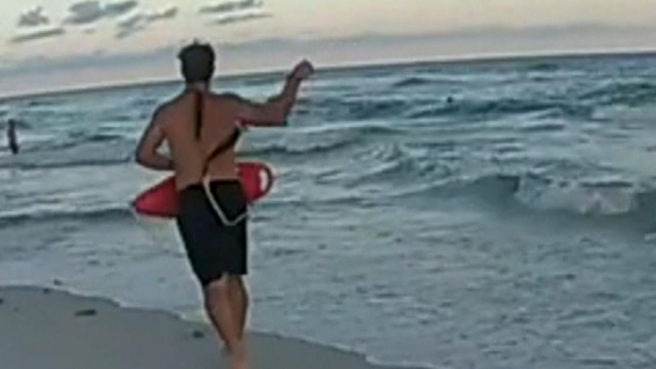 Swimmer Rescued After Being Caught in Rip Tide Current | Inside Edition