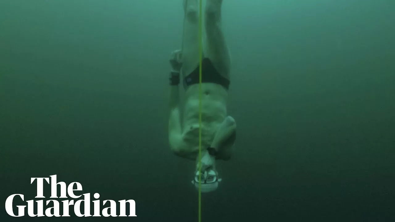 Free-Diver David Vencl Plunges to Record Depth in Frozen Swiss Lake | Guardian Sport
