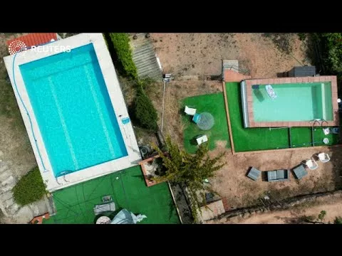 Swimming Pools Feel the Heat in Spain as Water Supplies Dwindle | Reuters Swimming Pools Feel the Heat in Spain as Water Supplies Dwindle | Reuters