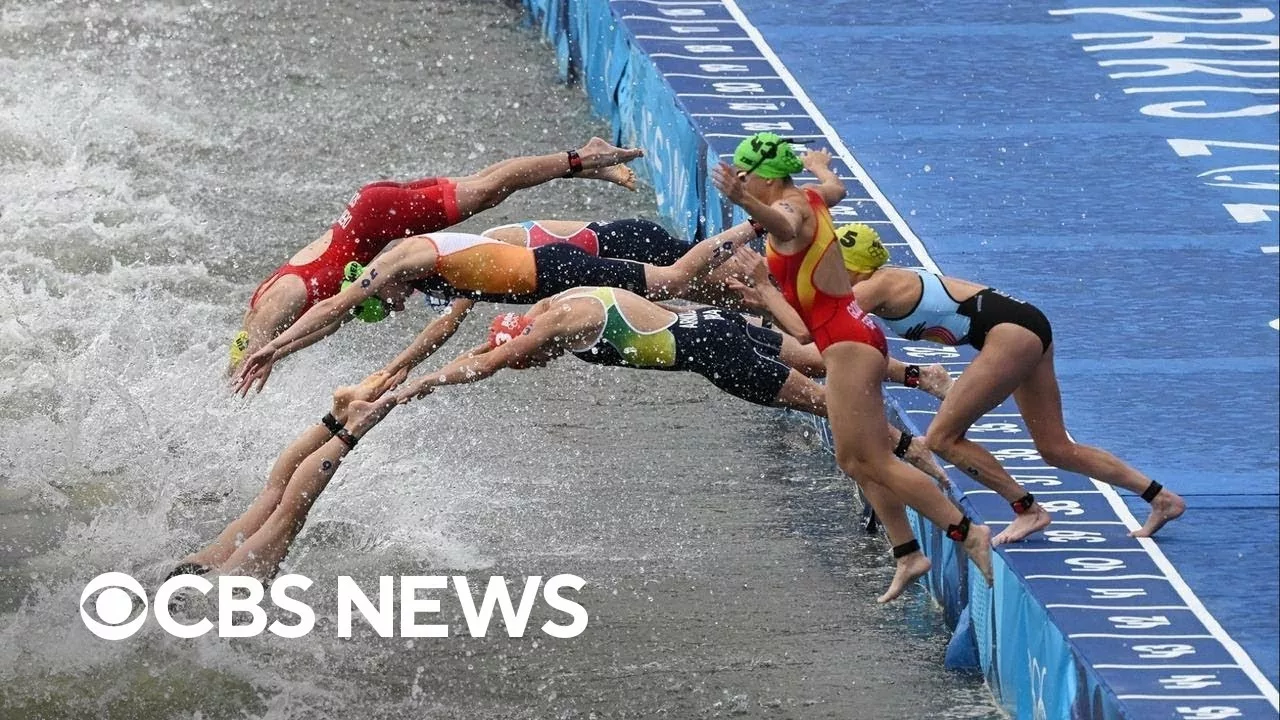 Olympic Triathletes Swim In Seine After Water Quality Delay | CBS News